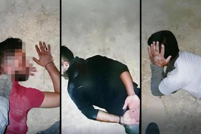 العمال الفلسطينيون الذين تعرضوا للتنكيل والسرقة كما صورهم أفراد الشرطة