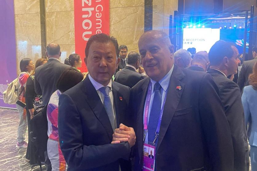 خلال لقاء جبريل الرجوب مع نائب رئيس اللجنة الأولمبية لي ينج تشوان.
