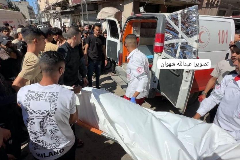 خلال نقل الشهداء من مكان القصف