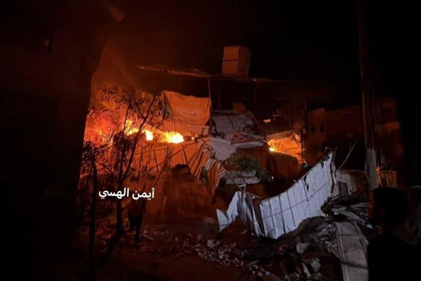 خلال عملية انتشال جثامين الشهداء