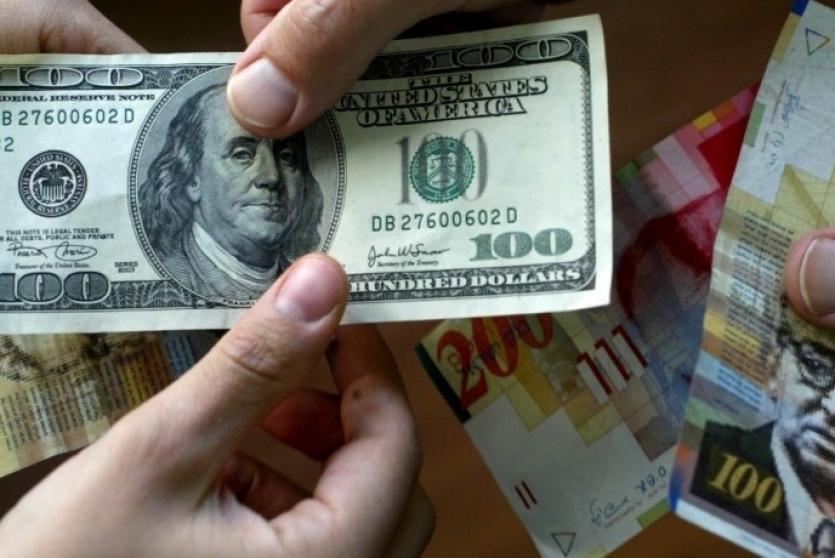 العملات - صرف الدولار مقابل الشيكل 